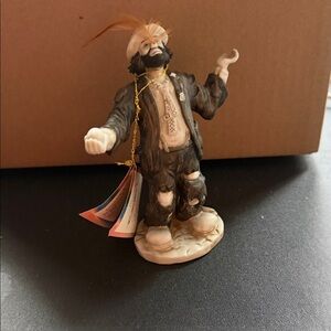 Charming Artisan Sculpture with Black and Cream Details